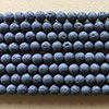 Photo of 15" strands of 8mm Black Lava Beads