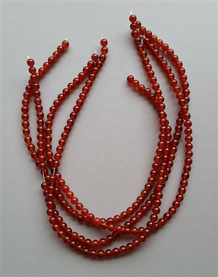 Photo of 6mm Carnelian Beads by the Strand