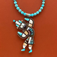 Photo of Zuni Rainbow Man pin/pendant, Circa 1950