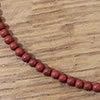 Photo of 4mm Red Jasper beads - matte finish - 15" strands