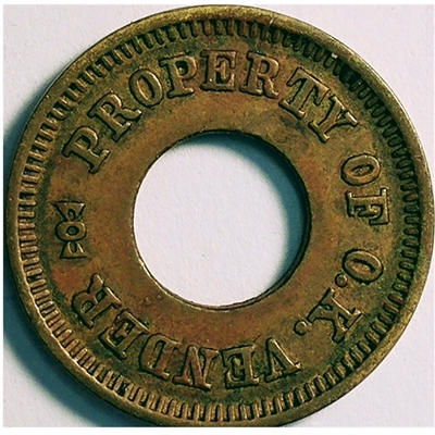 TS212. Property of OK Vender Amusement token. Diameter 21mm.