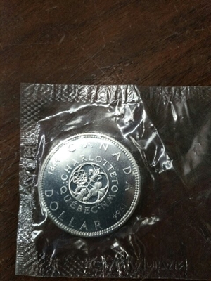 1964 Canada Proof Like Silver Dollar in Cellophane (May be lightly toned)