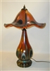 Beautiful Orange Peacock Table Lamp
Fabulous Even More Beautiful than the Picture
Beautiful Bronze base
The Lottons do all of their own bronze work
Lights top and base.
A Masterpiece. Museum Quality.