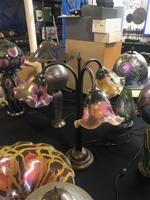 Daniel Lotton Triple Sunset Table Lamp
Sunset with different colors of flowers
on each shade.
One is Purple. One is Pink.  One is White.
This is the first triple by Daniel.