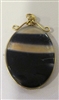 David Lotton Art Glass Pendant
Group was made by David in 1985 Signed or Initialed by David
Glass cut and polished and wrapped in gold wire.
Each Pendant is One of a Kind.
Size   1 by .5