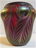 Charles Lotton Iridized   Red Peacock Vase
With Silver Eye
Beautiful Rolled over lip
Iridescent inside and out
Museum Quality. One of a Kind.
Signed Charles Lotton   Dated 2016
Size 7" by 6"