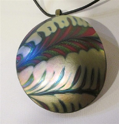 Kim Lotton Art Glass Pendant
Glass was hand blown by Daniel Lotton
Pendant cut and polished with silver catch added by
Kim Lotton.
Each Pendant is One of a Kind.
Each is shipped with a leather neck band.
Size of glass 2.5 by 2