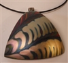 Kim Lotton Art Glass Pendant
Glass was hand blown by Daniel Lotton
Pendant cut and polished with silver catch added by
Kim Lotton.
Each Pendant is One of a Kind.
Each is shipped with a leather neck band.
Size of glass 2.5 by 2