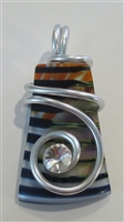 Kim Lotton Art Glass Pendant
Glass was hand blown by David Lotton
Pendant cut and polished with silver catch added by
Kim Lotton.
Each Pendant is One of a Kind.
Each is shipped with a leather neck band.
Size of glass 2 by 1.25