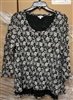 Famous Brand women's lace floral top.