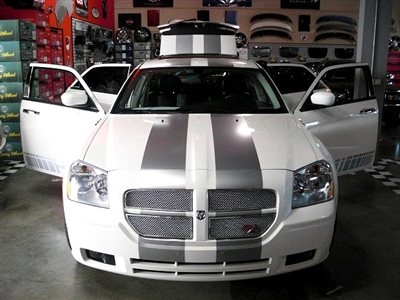 Black Dodge Magnum w/ Gold 10" Rally Stripes