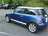 Blue Mini Cooper w/ White Mini "Cooper" Side Stripes