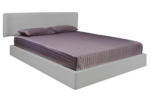 This modern bed looks like it is floating in mid-air. Available in white leatherette at Modern Home 2 Go