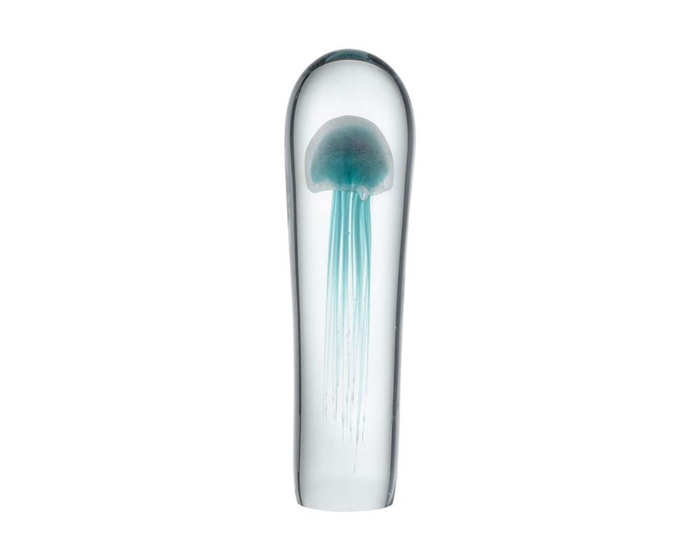 The Cay Glass Tabletop Sculpture is a long rounded cylinder of clear glass showing an inner orb of aqua blown glass reminiscent of a jellyfish surrounded by clear glass.