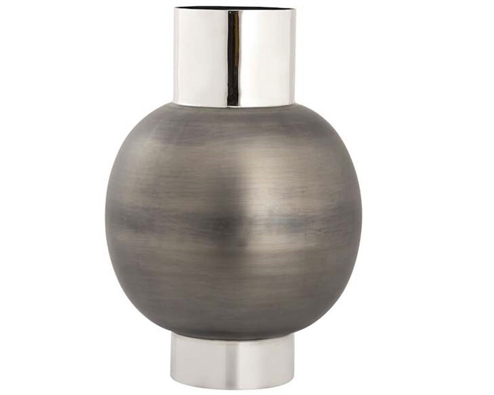 The Allred Vase is made from metal in a two-tone finish. This oversized vase has a banded base and cylindrical neck in a polished silver finish, and a rounded body in brushed gunmetal.