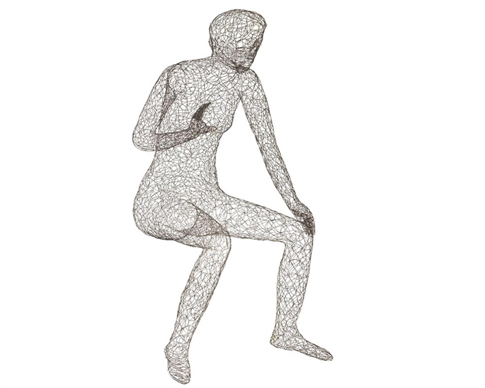 Crazy Wire Lounging Female. Woven from thin metal wire in a black finish, the nude sculpture has a dynamic presence at 52-inches high