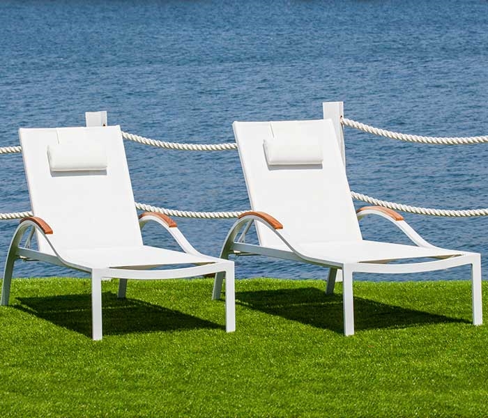 Amanda Modern White Sun Lounger with pillow available at Modern Home 2 Go