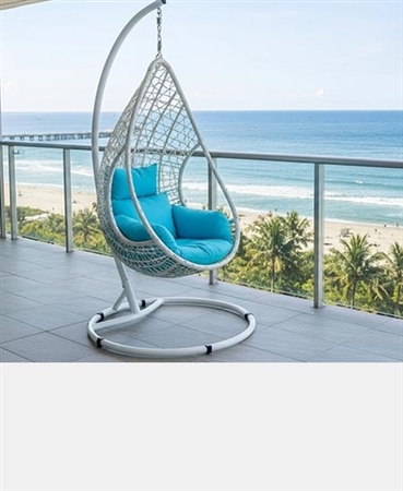 Add a unique piece to your outdoor space with our Bravo outdoor egg chair. Built from wash White wicker frame, blue seat cushions and a steel stand finished with a powder-coating in White. Completed with side handles to help you get in and out.