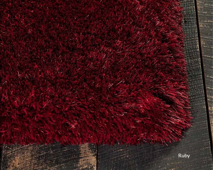 Close-up of Jaipur Modern Rug in Ruby with textured polyester surface.