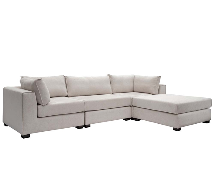 Vittoria sectional sofa in a modern living space, showcasing single armchair, armless chair, and ottoman configurations.