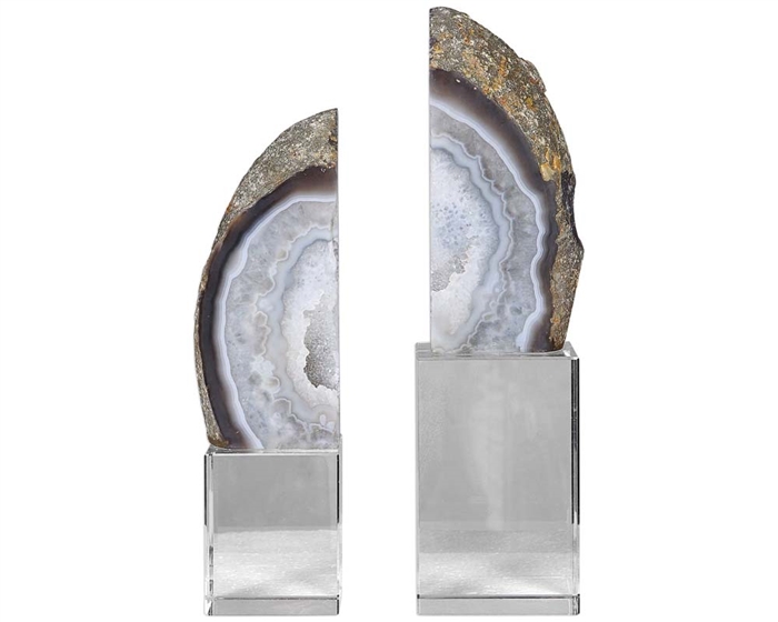 Amiya Modern Bookends Set of 2 Set of two bookends feature thick, gray marble with raw unfinished edges set atop clear crystal cube bases.