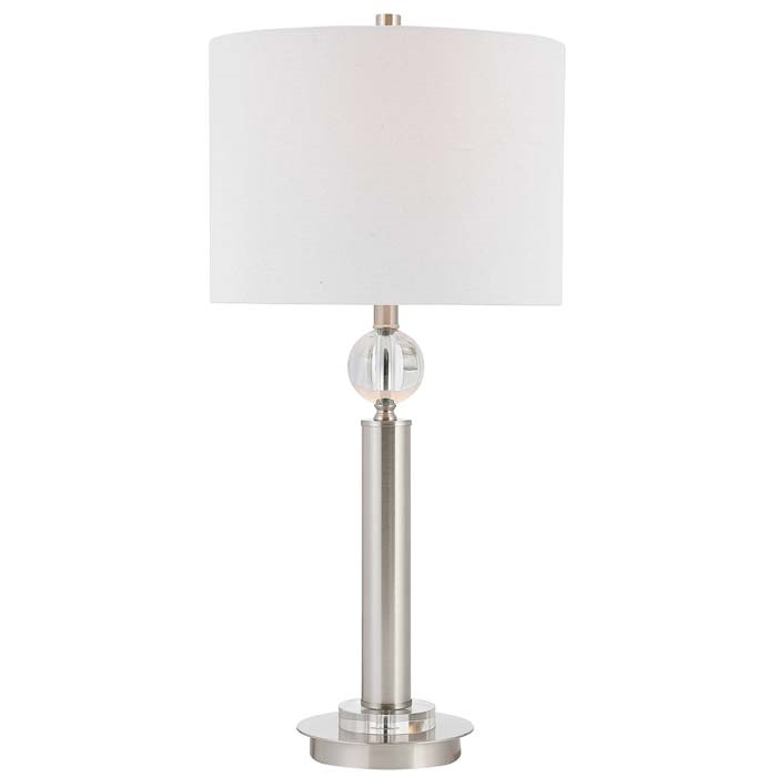 Brushed Nickel Modern Table Lamp. This simple but elegant table lamp is finished in brushed nickel with crystal accents. The round hardback shade is a white linen fabric with light slubbing.