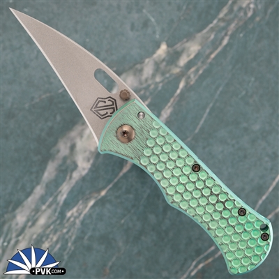 John Gray RostrumJohn Gray Rostrum, Hawkbill Blade, Antique Green & Bronze Hole Pattern Titanium Handle Scale