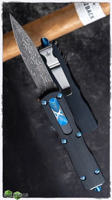 Marfione Custom Dirac Vegas Forge Vines & Roses Damascus Anodized Hefted Alloy With Ringed Blue Titanium Hardware.