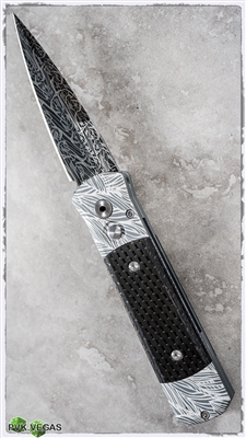 One of a kind Protech Godson laserwork done here in house at PVK with rare Thomas Eggerling Damascus Blade.