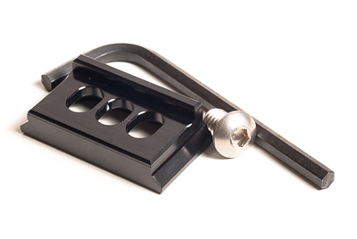 Arca-Swiss compatible 0.8 x 1.5 inch camera plate with three mounting slots and anti-twist ridge.