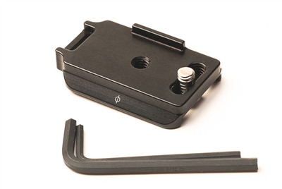 Arca-Swiss camera plate for Fujifilm X-T30 with battery compartment access and strap loop.