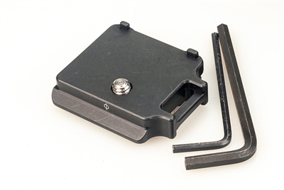 Arca-Swiss camera plate for Fujifilm X-T4 with battery compartment access and strap loop.