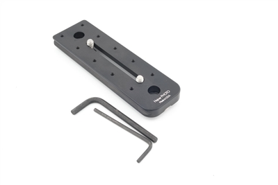 5.00 inch Arca-Swiss compatible double-dovetail lens plate featuring two QD sockets machined directly into the plate body. Ridge is optional and not included.