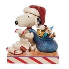 Peanuts By Jim Shore |   Checking it Twice - Santa Snoopy with List and Bag 6010323 | DBC Collectibles