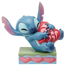 Jim Shore Disney Traditions | Heart Struck - Stitch Hugging Heart 6014316 | DBC Collectibles