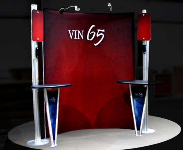 Custom trade show exhibit structures, like design # 56585 stand out on the convention floor. Draw eyes to your trade show booth with exciting custom exhibits & displays. We can customize any trade show exhibit or display to your specifications.