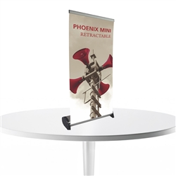 16in x 32in Phoenix Mini Retractable Tabletop Stand Display with Vinyl Banner - a small tabletop-sized version of larger roll-up signs. Ideal for retail store point of purchase counter tops, convention tables, or just about anywhere you want a sign