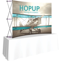 8ft Curved HopUp 3x2 Tabletop Fabric Display with Front Graphic is the instant trade show table top solution! Hopup is an all new light weight yet heavy duty frame that suspends a fabric graphic image