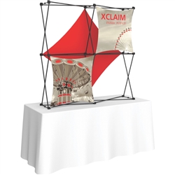 5ft Xclaim 3-D PopUp Table Top Display Kit 03 with Full Fabric Graphics. Portable tabletop displays and exhibits. Several different styles are available, including pop up frames with stretch fabric or fold up panels with custom graphics.
