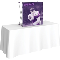 3ft Embrace Tabletop Push-Fit Tension Fabric Display with Front Graphic. Portable tabletop displays and exhibits. Several different styles are available, including pop up frames with stretch fabric or fold up panels with custom graphics.