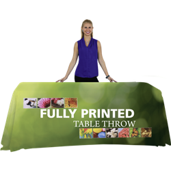 Complete your trade show or presentation with this 8ft Draped custom dye-sub printed Four Sided table throw.   All of our custom tablecloths are printed with dye-sublimation to give brilliant, rich colors that command attention. In addition the dye-sublim