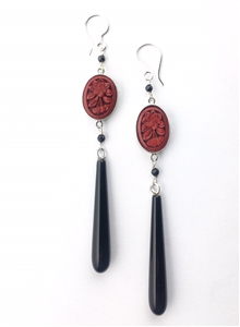 Long earrings with antique carved cinnabar and black onyx drops in sterling silver.