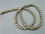 16 inch strand of 5.5-6mm olive green fresh water pearls
