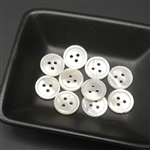 Ten 3-holed antique mother of pearl buttons