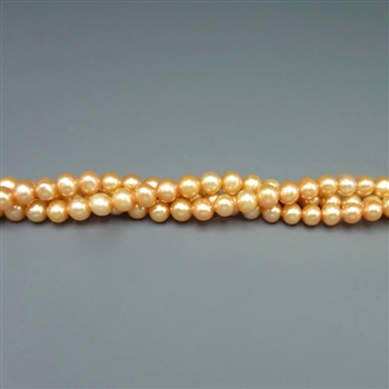 3.5-4mm round peach fresh water pearls, one 16" strand