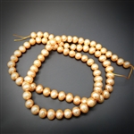 4.5-5mm blushcolored round fresh water pearls, one 15 inch strand