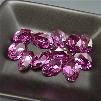 10x14mm Swarovski oval stones (article 4120), fuchsia, 12 pieces