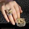 Cheetah head ring "Swift" by wildlife jeweler and artist Daniel C. Toledo of Toledo Wildlife Works of Art features rhodium and 22k gold plated over sterling silver, black enamel, citrine eyes.  Limited edition of 250