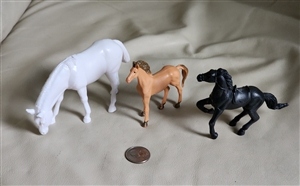 Various horses decor and collectible toys display