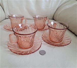 Pink glass teacups and saucers Arcoroc France
